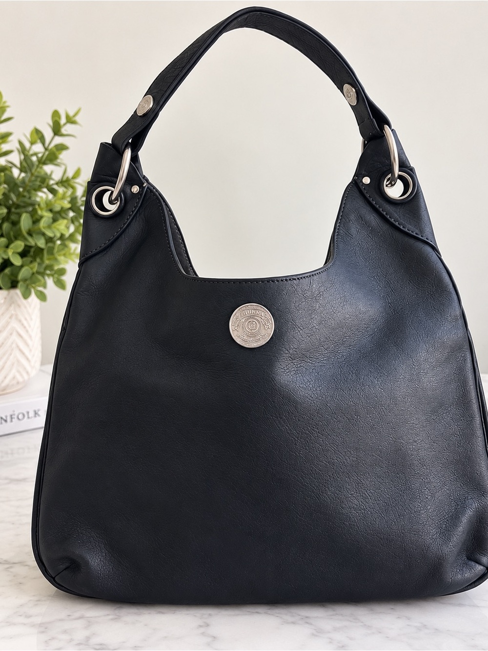 Ghurka Chandra Black Leather Shoulder Bag with Silver Coin Accent